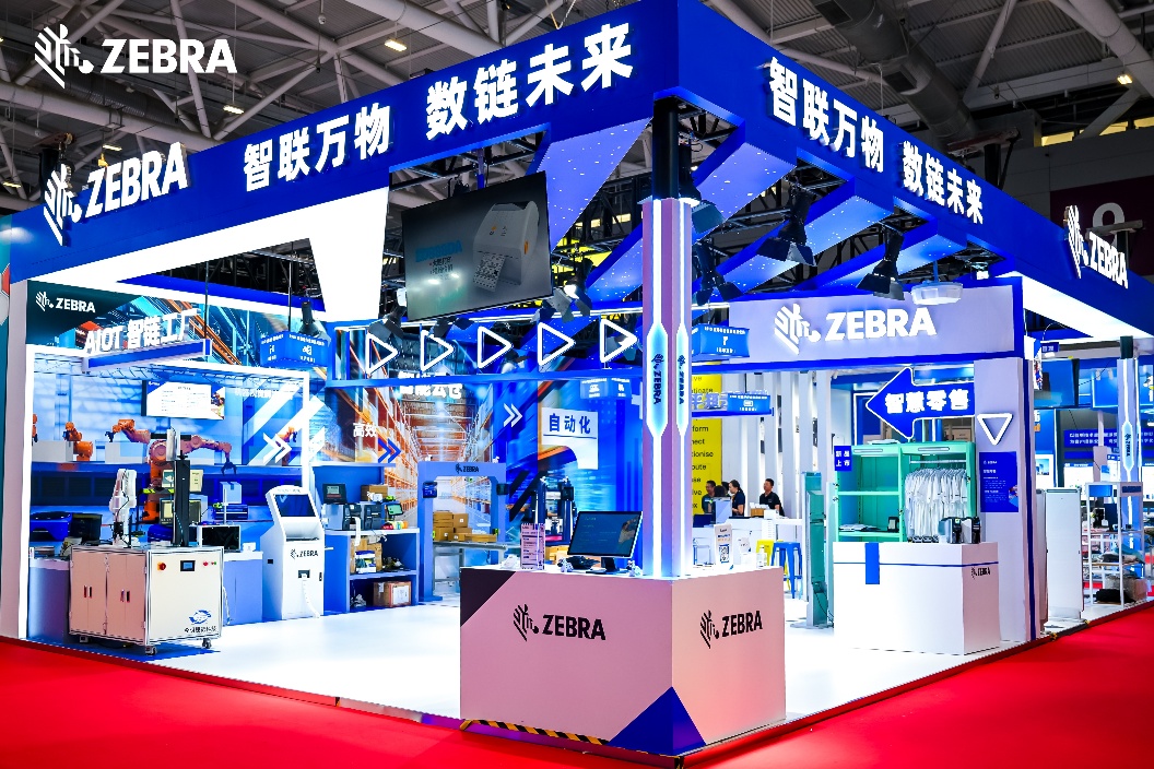 A blue and white booth with red carpet AI-generated content may be incorrect.