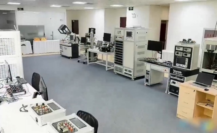 A room with several computers AI-generated content may be incorrect.