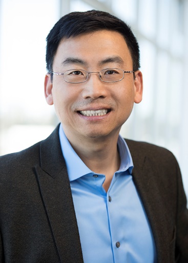 Medium shot of a person wearing glasses Description automatically generated